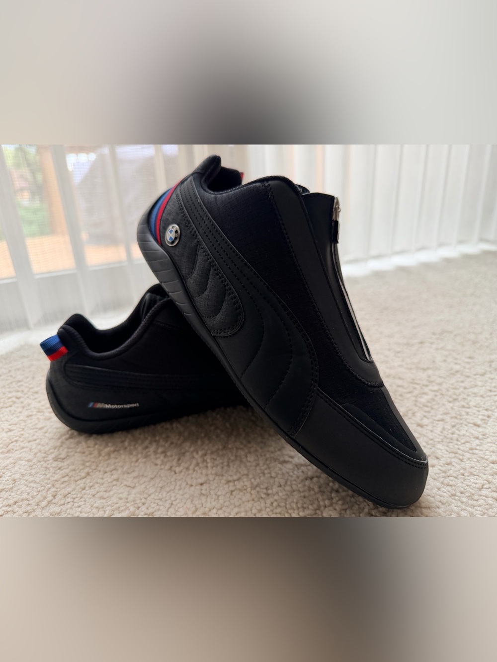 Puma Black low-profile Sneakers with Red & Blue Heel Accents